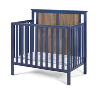 Connelly Mini Crib With Mattress Pad Midnight Blue Vintage Walnut Blue Brown Wood