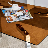 Table And Chair Set.Large Modern Rectangular Table With Brown Glass Top And Silver Metal Legs. Paired With 6 White Chairs With Checkered Armless High Back Pu Cushion And Silver Metal Legs.