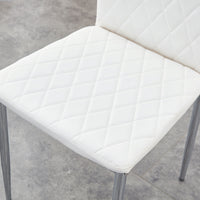 Table And Chair Set.Large Modern Rectangular Table With Brown Glass Top And Silver Metal Legs. Paired With 6 White Chairs With Checkered Armless High Back Pu Cushion And Silver Metal Legs.