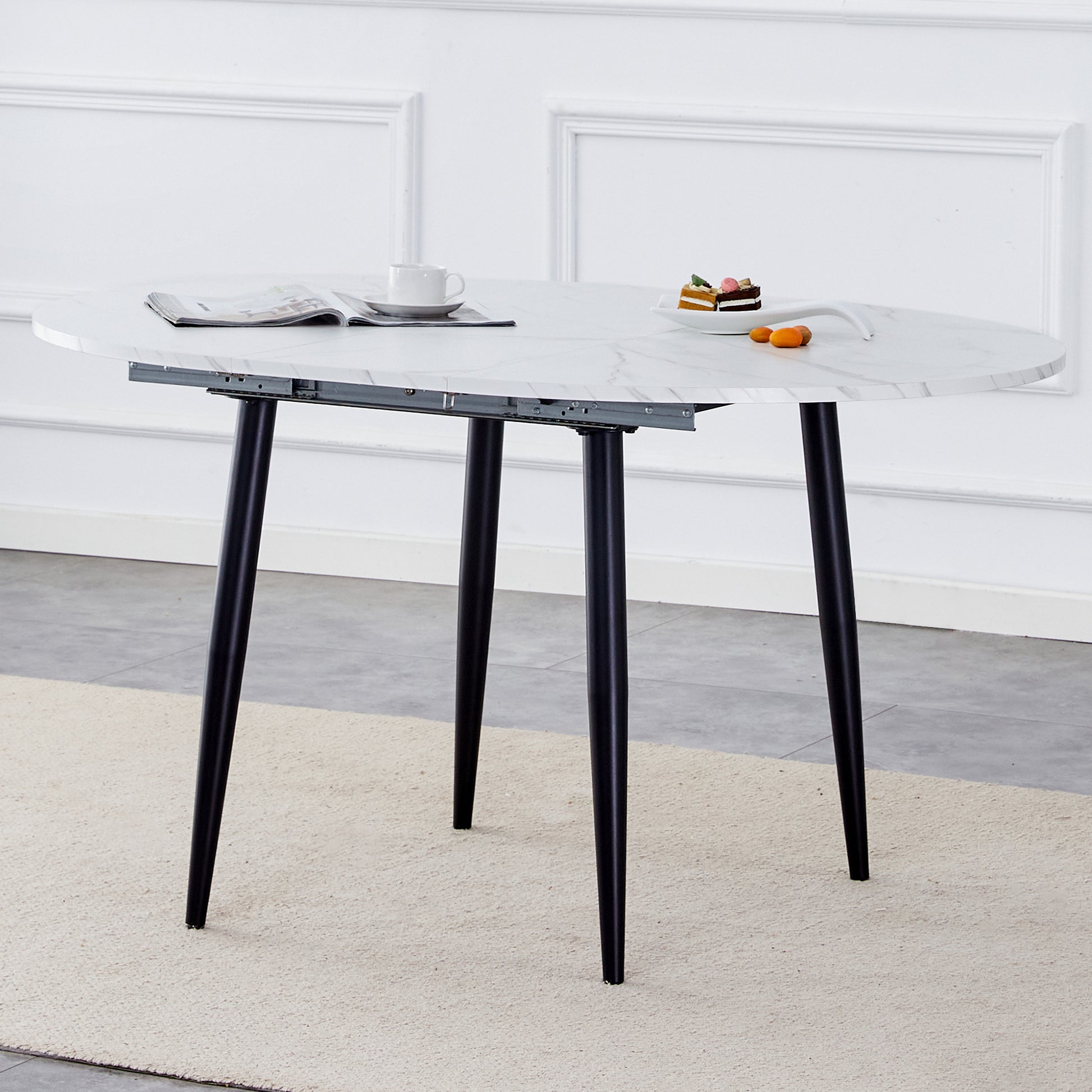 With A Clever Retractable Mechanism, The Mdf Table Top Is Made Of Black Metal Legs And Has A Smooth And Delicate Surface. The Unique Look Creates The Sleekof A Modern Home. White Mdf Metal