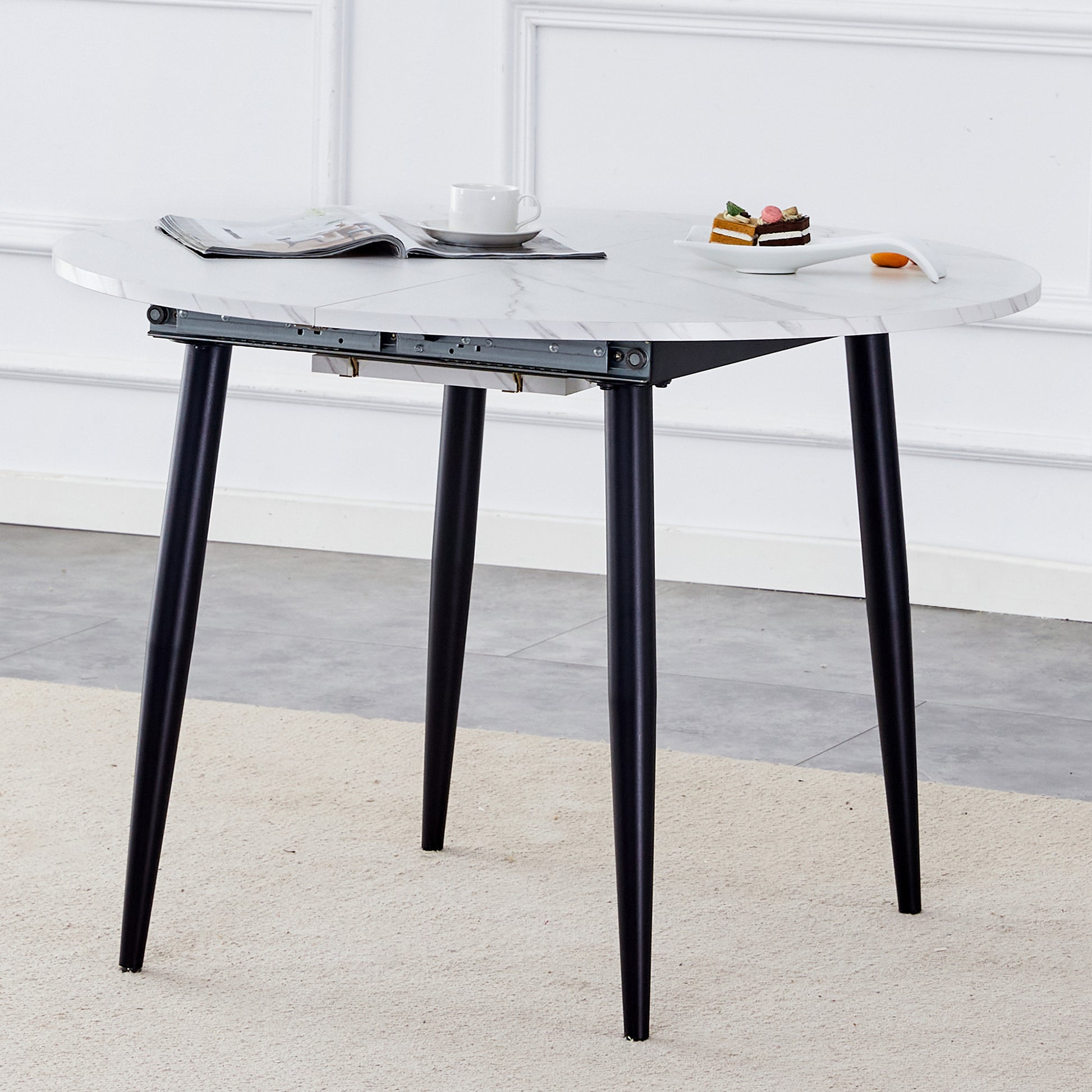 With A Clever Retractable Mechanism, The Mdf Table Top Is Made Of Black Metal Legs And Has A Smooth And Delicate Surface. The Unique Look Creates The Sleekof A Modern Home. White Mdf Metal